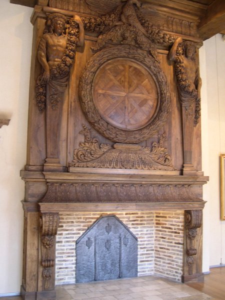  belle cheminée de bois sculpté